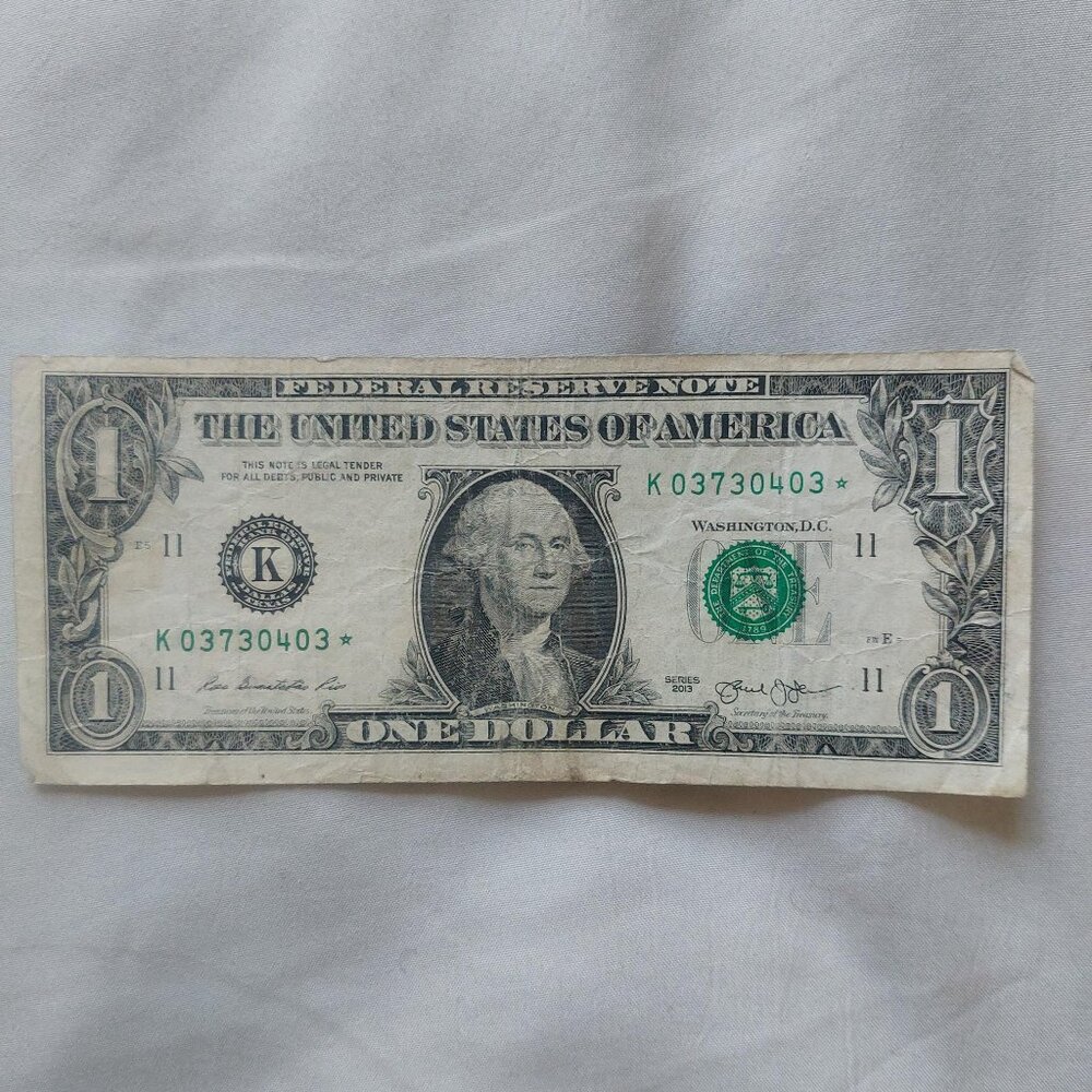 $1 dollar bill with star note